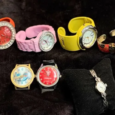 Vintage & Contemporary Fashion & Novelty Watches Featuring Gruen Dress Watch   