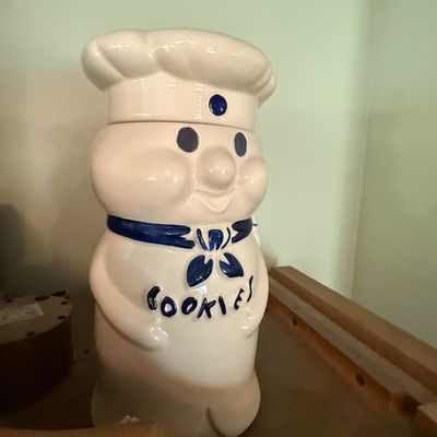 Sale Photo Thumbnail #3: Vintage Pillsbury Doughboy ceramic cookie jar with blue painted accents.