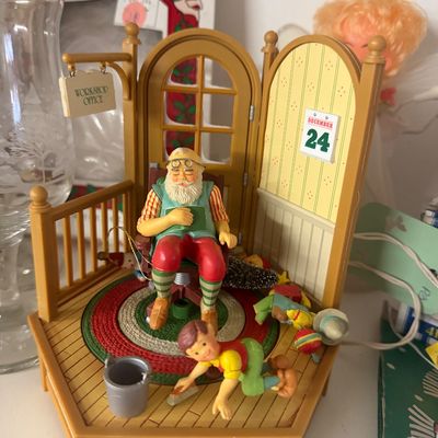 Vintage Hallmark Keepsake 'Santa's Workshop' music box display LP featuring Santa sleeping in a chair and an elf scrubbing...