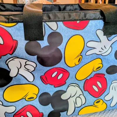Sale Photo Thumbnail #87: Disney Mickey Mouse themed utility tote bag featuring a pattern of Mickey's gloves, shoes, shorts, and silhouette.