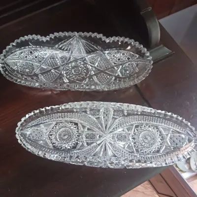 Sale Photo Thumbnail #24: Pair of vintage American Brilliant Period cut glass oval relish dishes, featuring intricate geometric star and crosshatch patterns with sawtoothed rims.