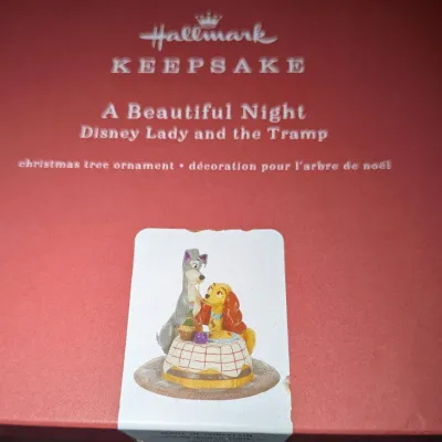 Sale Photo Thumbnail #49: Hallmark Keepsake "A Beautiful Night" Disney Lady and the Tramp porcelain Christmas tree ornament in its original box.