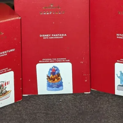 Sale Photo Thumbnail #54: Set of three Disney Hallmark Keepsake Christmas ornaments in original red boxes, including Disney Jungle Cruise, Disney Fantasia 80th Anniversary, and The Haunted Mansion Hitchhiking Ghosts.