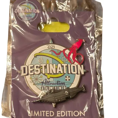 Sale Photo Thumbnail #29: Disney D23 Destination D Attraction Rewind limited edition commemorative pin featuring the Nautilus submarine and giant squid, sealed in original packaging.