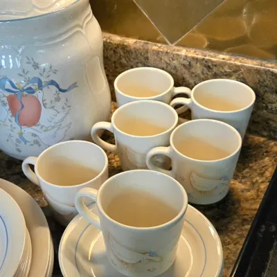Sale Photo Thumbnail #19: Vintage 1980s country geese ceramic dinnerware set, including coffee mugs, saucers, plates, and a large matching cookie jar.