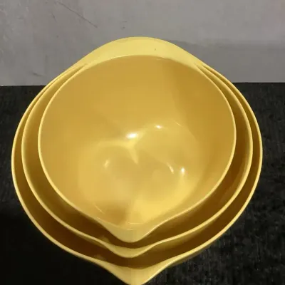A Set Of Melamine Nesting Mixing Bowls With Pouring Spouts