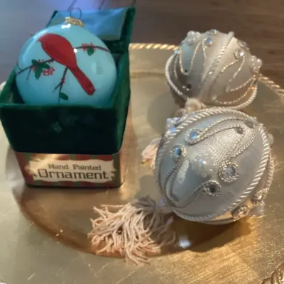 A Hand Painted Glass Cardinal Ornament In A Green Velvet Box and Two Satin, with Tassels Ornaments