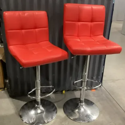 A Pair Of Red Adjustable Height Swivel Bar Stools
