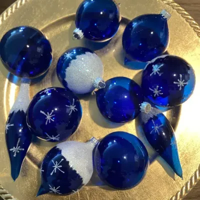 A Set Of 11 Cobalt Blue Mouth Blown Glass Snow Flake Ornaments