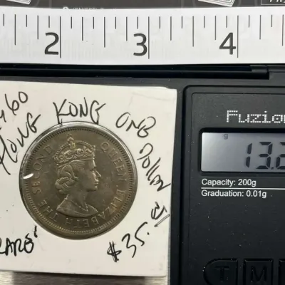Sale Photo Thumbnail #79: 1960 Hong Kong One Dollar Queen Elizabeth II Coin