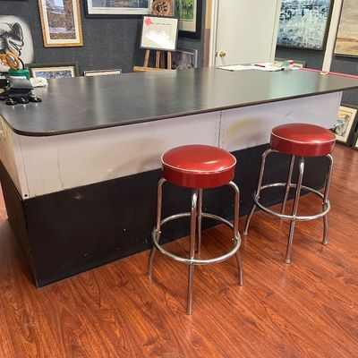 Flat file work table with counter and retro vinyl stools