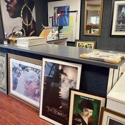 Tons of professionally framed artwork 