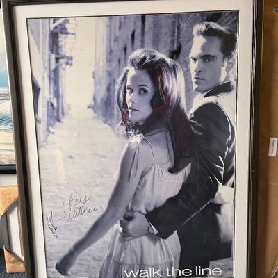Autographed movie poster. Signed by Reese Witherspoon and Joaquin Phoenix 