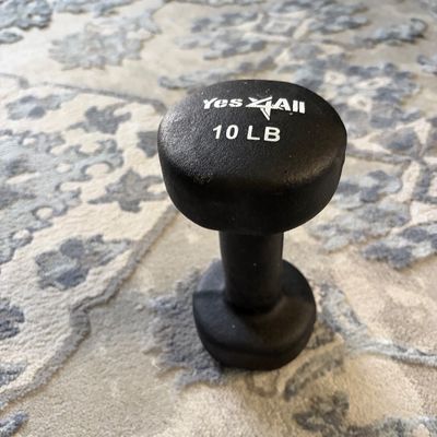 Yes4All 10 lb neoprene-coated hand weight dumbbell in black, showing light wear.