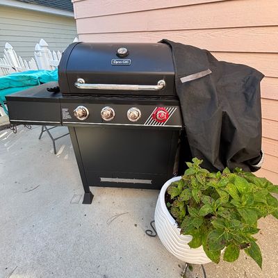 Dyna-Glo black propane gas grill with stainless steel handles