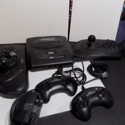 Sega Genesis Model 2 home video game console bundle, including two standard controllers, two arcade joystick controllers, and power...