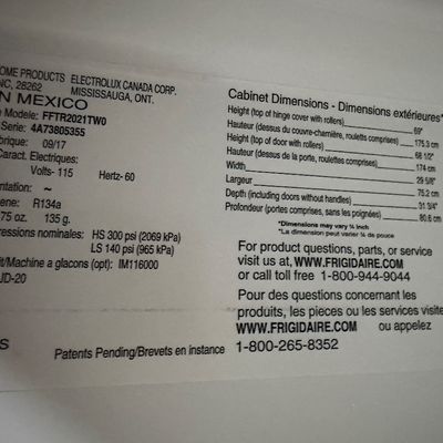 Manufacturer specification and serial number sticker for a Frigidaire refrigerator, model FFTR2021TW0, manufactured September 2017.