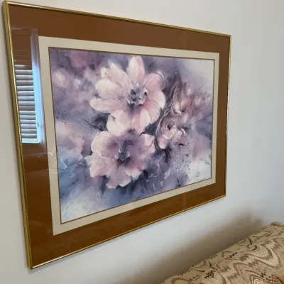 Sale Photo Thumbnail #11: Large framed watercolor print depicting pink flowers on a muted background, set in a double mat with a thin gold-tone metal frame.
