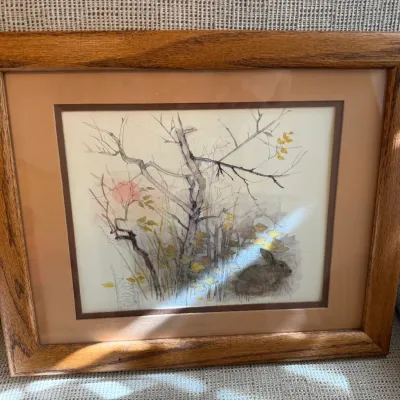 Sale Photo Thumbnail #5: Framed illustration of a rabbit in a winter woodland landscape, double-matted in a solid oak wood frame.