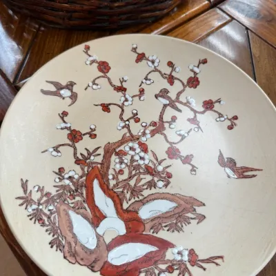 Sale Photo Thumbnail #13: Vintage Asian-style ceramic decorative plate featuring hand-painted cherry blossoms, birds, and raised enamel accents.
