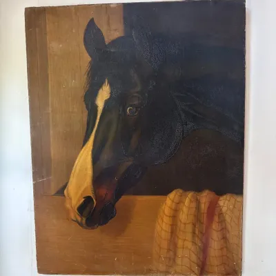 Vintage unframed oil painting depicting a dark horse looking out from a stable door. The piece shows visible age-related crackle and wear...