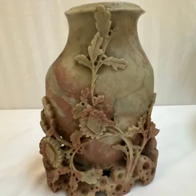 Sale Photo Thumbnail #41: Hand-carved Chinese soapstone vase with intricate floral and botanical openwork high-relief details, featuring natural variegated tones.