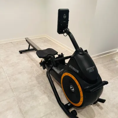 Sale Photo Thumbnail #20: Octane Fitness RO commercial-grade rowing machine with digital console display, showing light wear.