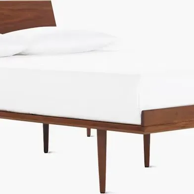 Sale Photo Thumbnail #23: Herman Miller Mid-century modern walnut platform bed frame featuring tapered legs and a solid wood headboard.