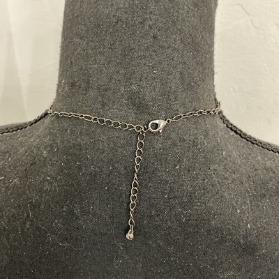 Sale Photo Thumbnail #126: A gothic-style dark gunmetal tone choker necklace featuring a layered chain design adorned with round pink rhinestone accents and faceted pink teardrop glass/crystal dangling beads. Includes an adjustable extension chain with a lobster claw clasp. Appears