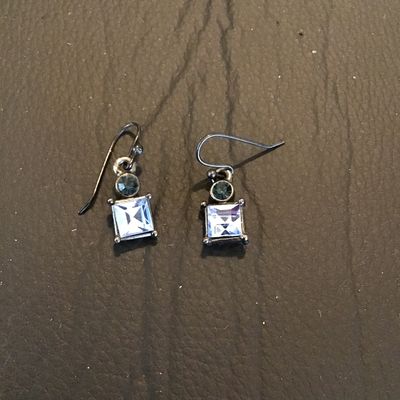 Sale Photo Thumbnail #223: Pair of dangle drop French wire earrings featuring square clear faceted rhinestones or crystals with small round blue accent stones set in dark silver-tone metal settings. In good pre-owned condition.