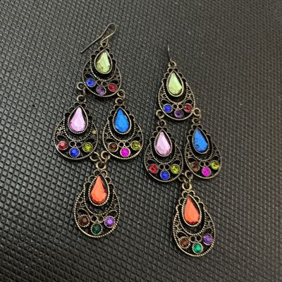 Sale Photo Thumbnail #149: Pair of antique gold-tone brass chandelier drop earrings set with colorful teardrop and round rhinestones in shades of green, pink, blue, orange, purple, and red. Features French hook ear wires. Measure approximately 3.5 inches (9 cm) in length. Good cond