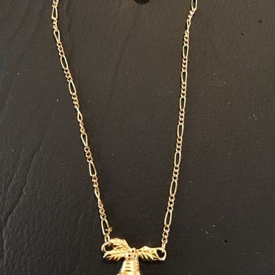 Sale Photo Thumbnail #119: Vintage AvonGold -tone fine figaro chain bracelet featuring a holiday bell motif with holly leaves and a spring-ring clasp. Marked near the clasp tag.