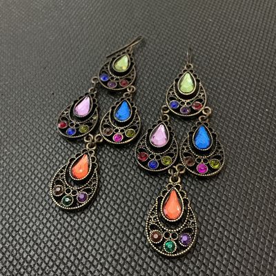 Sale Photo Thumbnail #146: Pair of antique gold-tone brass chandelier drop earrings set with colorful teardrop and round rhinestones in shades of green, pink, blue, orange, purple, and red. Features French hook ear wires. Measure approximately 3.5 inches (9 cm) in length. Good cond
