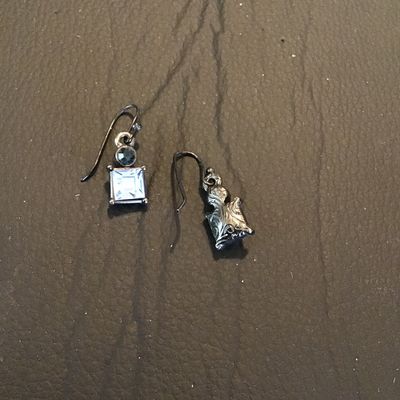 Sale Photo Thumbnail #227: Pair of dangle drop French wire earrings featuring square clear faceted rhinestones or crystals with small round blue accent stones set in dark silver-tone metal settings. In good pre-owned condition.