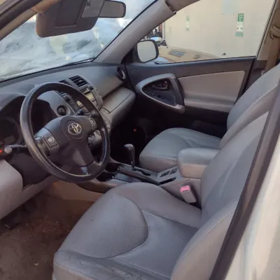 Sale Photo Thumbnail #11: Toyota RAV 4 with 195,000 miles.  This is a cash, cashier's check or wire transfer purchase only.  Sold as is with no warranty or guarantees.  Vehicle has obvious exterior damage to rear and front bumpers and passenger side panels.  Interior will need det