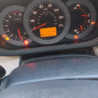 Sale Photo Thumbnail #12: Toyota RAV 4 with 195,000 miles.  This is a cash, cashier's check or wire transfer purchase only.  Sold as is with no warranty or guarantees.  Vehicle has obvious exterior damage to rear and front bumpers and passenger side panels.  Interior will need det