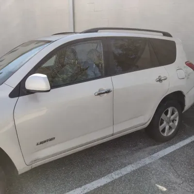 Sale Photo Thumbnail #2: Toyota RAV 4 with 195,000 miles.  This is a cash, cashier's check or wire transfer purchase only.  Sold as is with no warranty or guarantees.  Vehicle has obvious exterior damage to rear and front bumpers and passenger side panels.  Interior will need det
