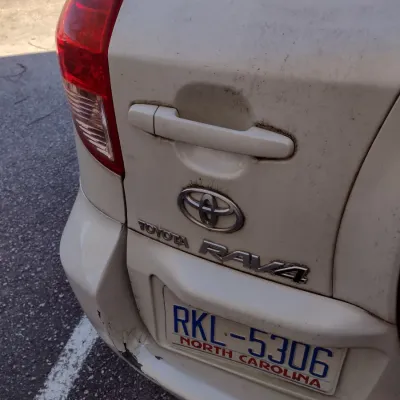 Sale Photo Thumbnail #6: Toyota RAV 4 with 195,000 miles.  This is a cash, cashier's check or wire transfer purchase only.  Sold as is with no warranty or guarantees.  Vehicle has obvious exterior damage to rear and front bumpers and passenger side panels.  Interior will need det