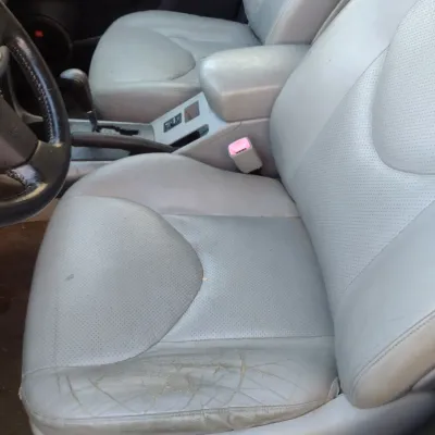 Sale Photo Thumbnail #13: Toyota RAV 4 with 195,000 miles.  This is a cash, cashier's check or wire transfer purchase only.  Sold as is with no warranty or guarantees.  Vehicle has obvious exterior damage to rear and front bumpers and passenger side panels.  Interior will need det