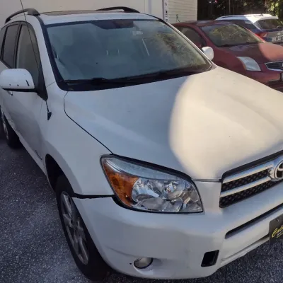 Sale Photo Thumbnail #10: Toyota RAV 4 with 195,000 miles.  This is a cash, cashier's check or wire transfer purchase only.  Sold as is with no warranty or guarantees.  Vehicle has obvious exterior damage to rear and front bumpers and passenger side panels.  Interior will need det