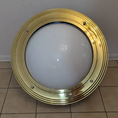 Sale Photo Thumbnail #35: Flush-mount polished brass ceiling light featuring a thick stepped metal trim and a domed frosted white glass shade.