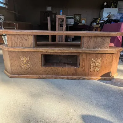 Sale Photo Thumbnail #60: Vintage oak entertainment stand featuring open component shelves and ornate carved scrollwork detailing on the front panels.