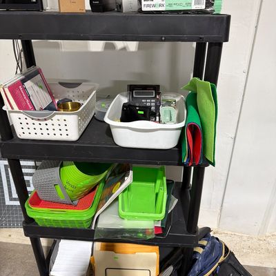 Sale Photo Thumbnail #48: Baskets, fiskars  cutting board, paper, and supplies.
Shelves not included.