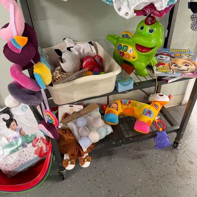 Sale Photo Thumbnail #100: Toys and new Children’s clothing 

shelf and bin it included