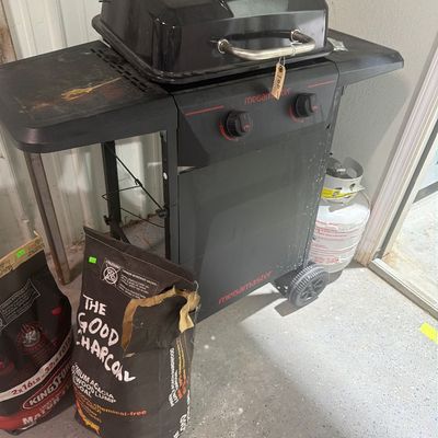 Sale Photo Thumbnail #174: Charcoal Grill with Charcoal and propane tank with a little in it.  And ICE Chest