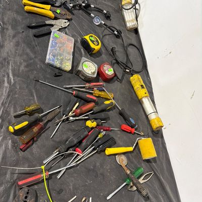 Sale Photo Thumbnail #145: Screw drivers, clamps, measuring tapes and more.