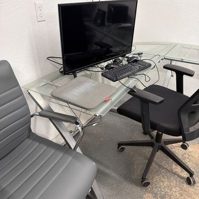 Sale Photo Thumbnail #104: Glass corner desk and three chairs, and Electronics.