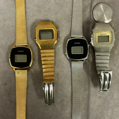 4 Assorted Microma Watches (one Broken) 