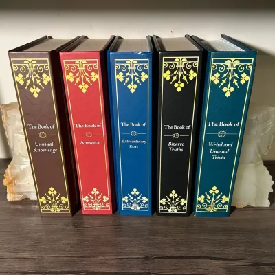 Set Of Interesting Hardback Books With Marble Bookends 