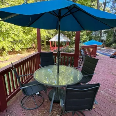 Round Patio Table, Umbrella & Four Swivel Sling Back Chairs